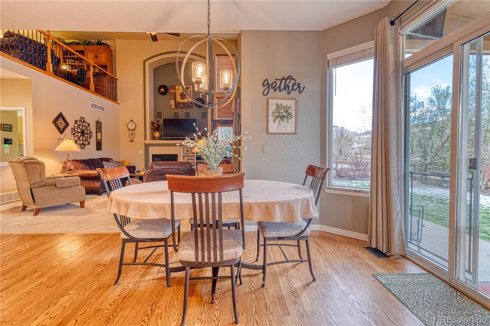 6378 Umber Circle Arvada, CO 80403 - Photo 27 of 50 a view of a dining room with furniture window and outside view