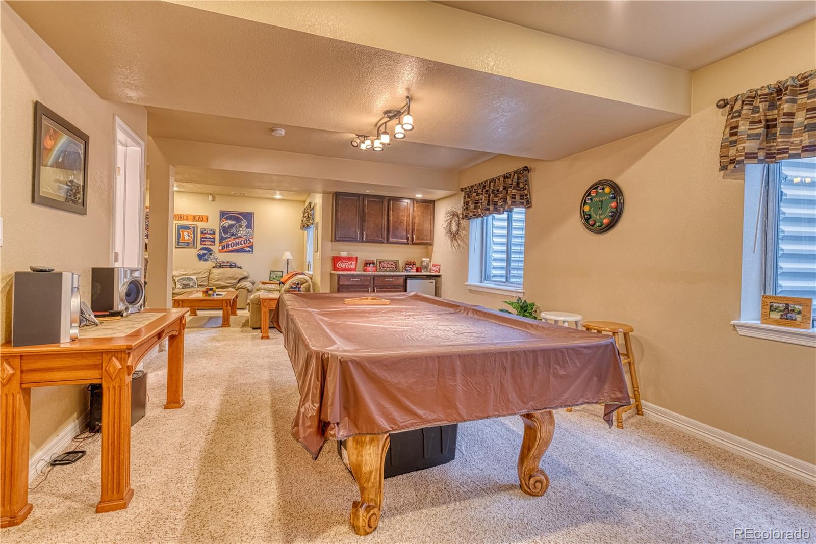 6378 Umber Circle Arvada, CO 80403 - Photo 39 of 50 a view of a dining room with furniture