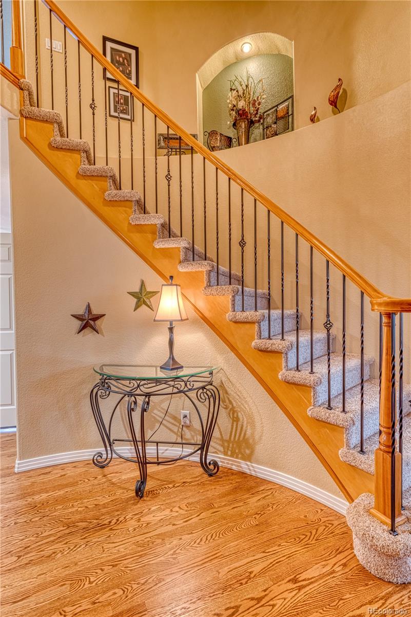 6378 Umber Circle Arvada, CO 80403 - Photo 43 of 50 a view of a swimming pool with lounge chair