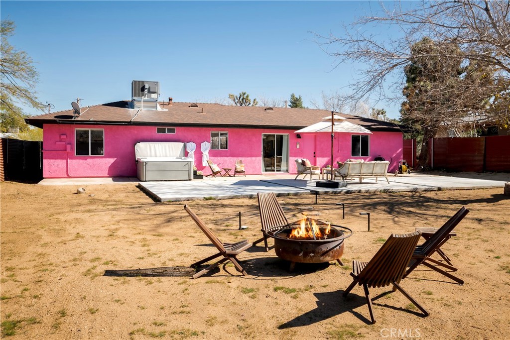7566 Shawnee Trail Yucca Valley, CA 92284 - Photo 22 of 28 a view of swimming pool with outdoor seating