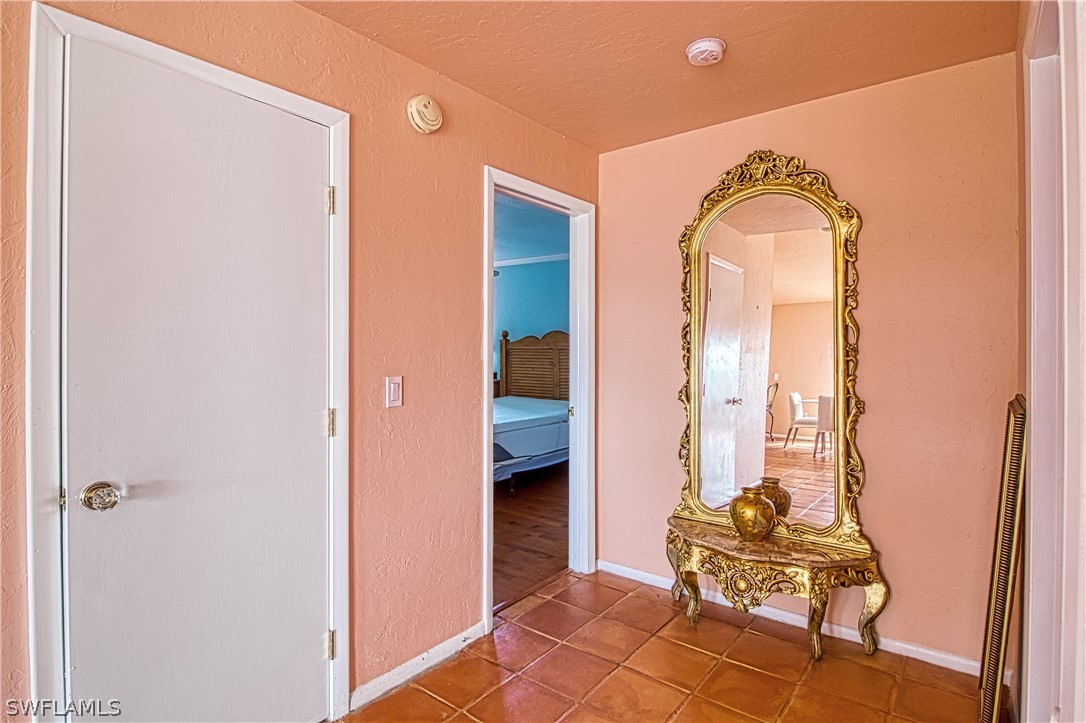 954 Sand Castle Road Sanibel, FL 33957 - Photo 17 of 29 a view of a livingroom with furniture and wooden floor