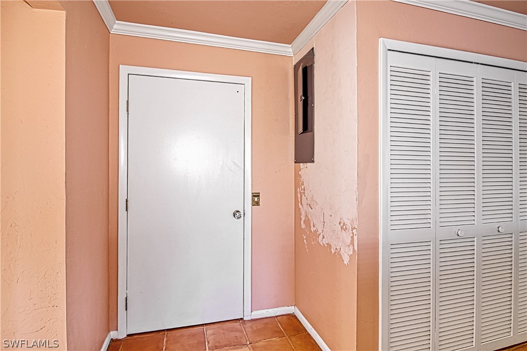 954 Sand Castle Road Sanibel, FL 33957 - Photo 26 of 29 a view of a small space with wooden floor and a window