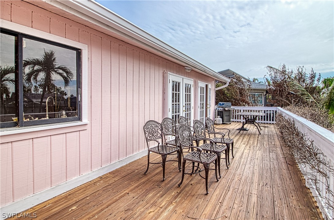 954 Sand Castle Road Sanibel, FL 33957 - Photo 9 of 29 a view of a house with backyard and sitting area