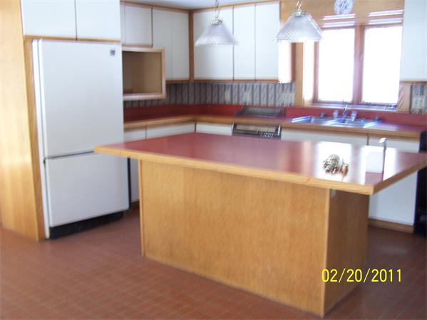 100 A Brook Road Shelburne, MA 01370 - Photo 5 of 5 a kitchen with refrigerator and table