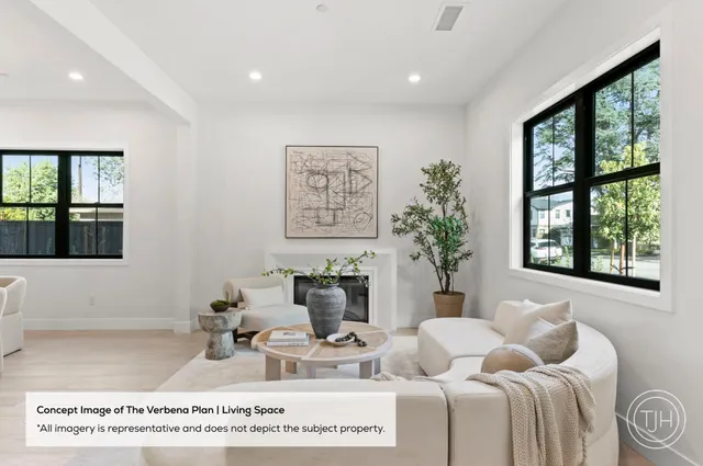 a living room with furniture and window