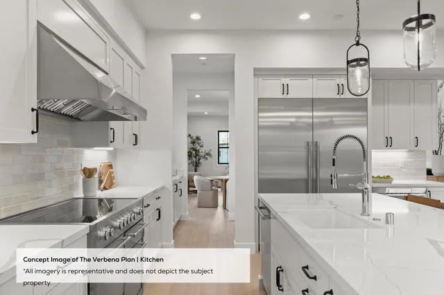 a kitchen with stainless steel appliances granite countertop a sink dishwasher and cabinets with wooden floor