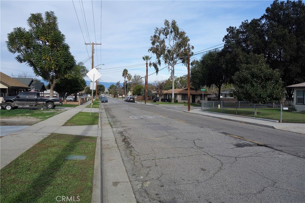 2643 Orange Street Riverside, CA 92501 - Photo 8 of 22 a view of a park with swings and slides