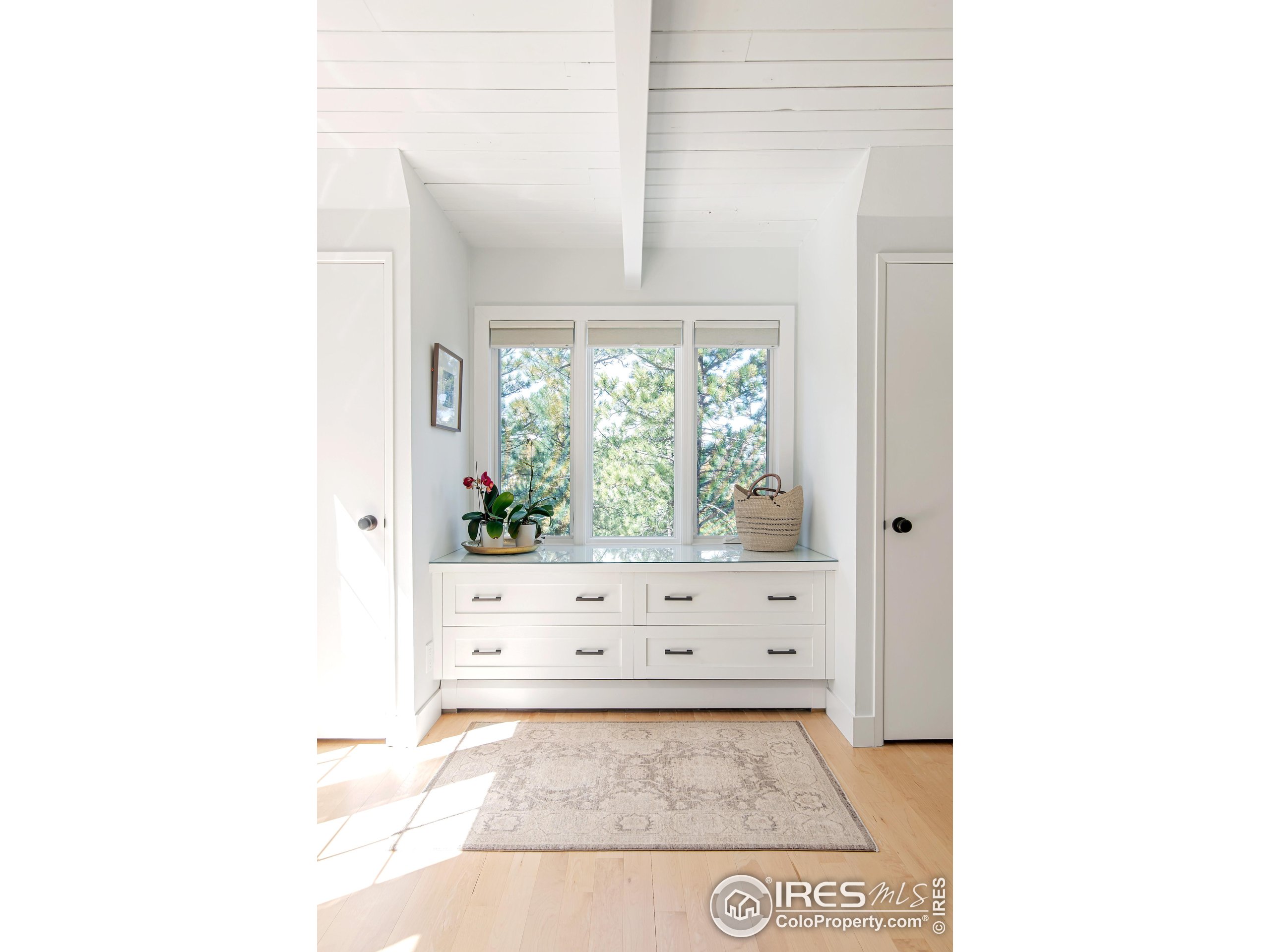 65 Bristlecone Way Boulder, CO 80304 - Photo 20 of 49 a view of a living room with a large window