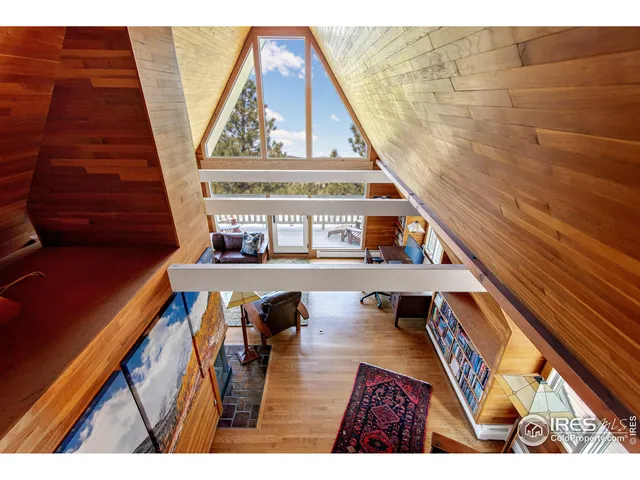 a picture of a bench in front of a house