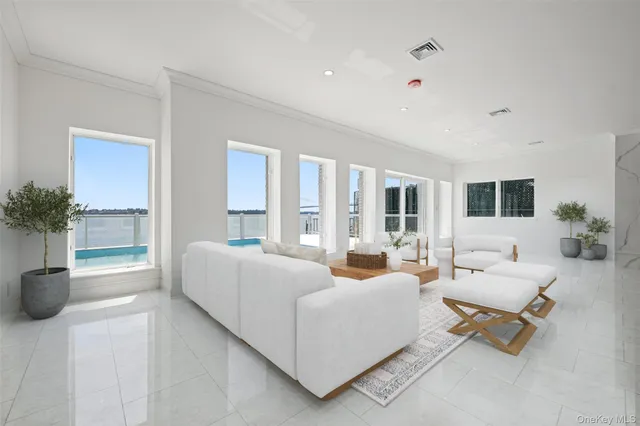 a living room with furniture and a couch