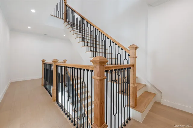 a bedroom with a large bed and a couch