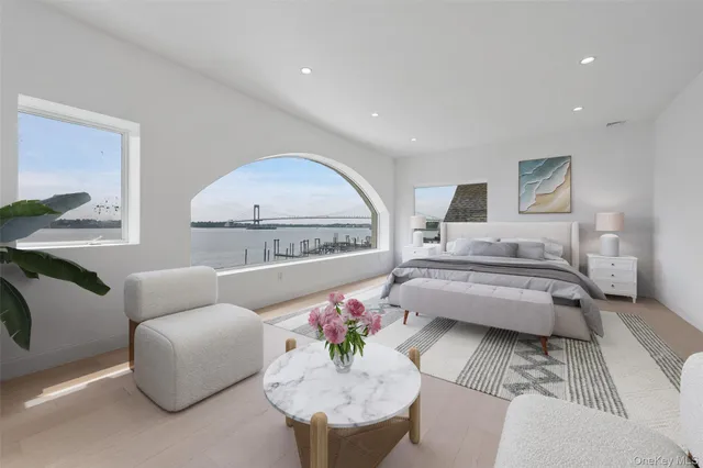 a spacious bathroom with a bathtub and sink