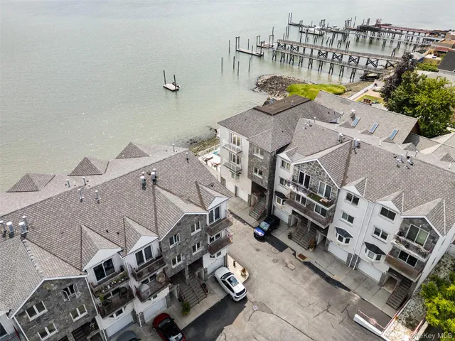 a view of a city with lawn chairs
