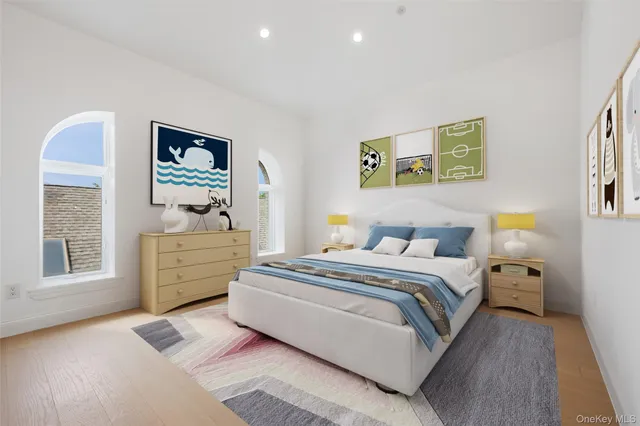 a living room with furniture and cabinets