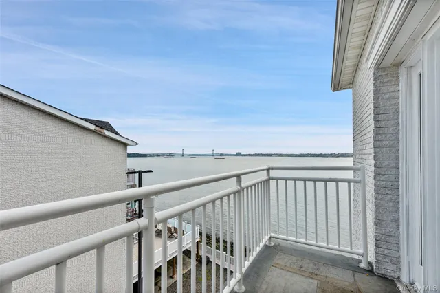 a view of swimming pool with a lounge chair