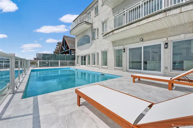 a front view of a building with parking space