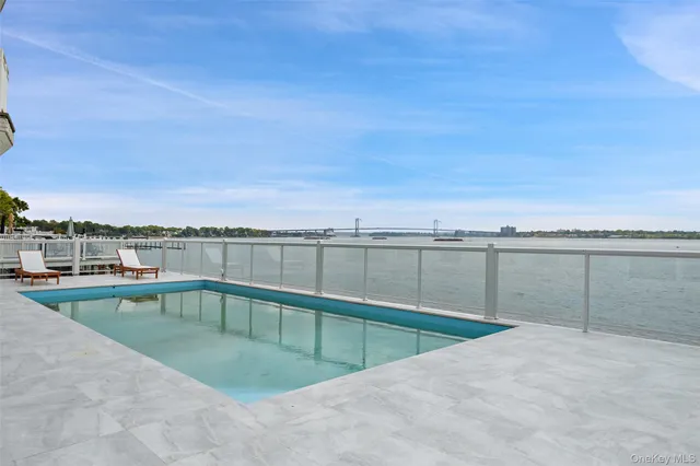 a bathroom with a sink a toilet and bathtub