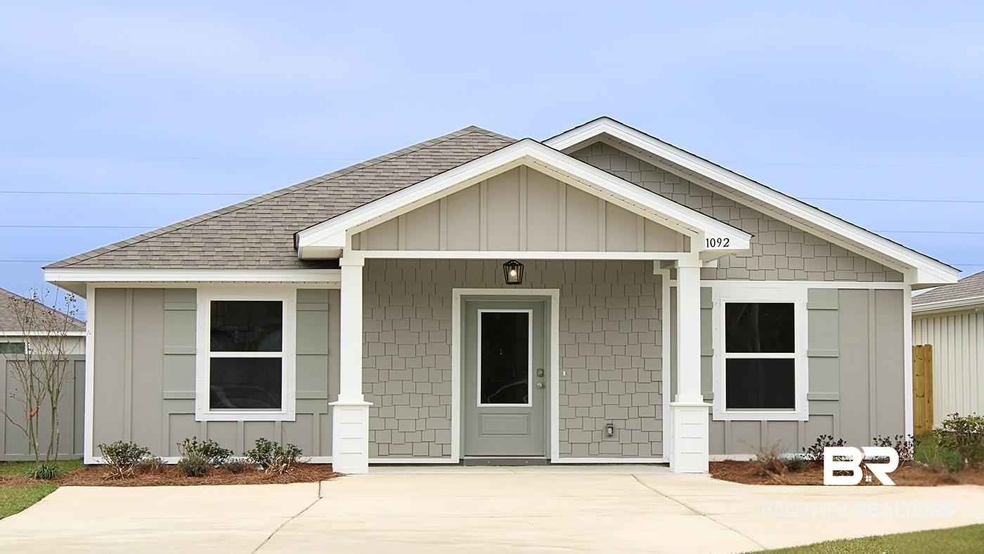 1092 South Bay Street Foley, AL 36535 - Photo 1 of 28 View of front of home featuring a front lawn
