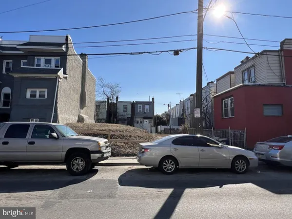 a view of a car parked in front of a house