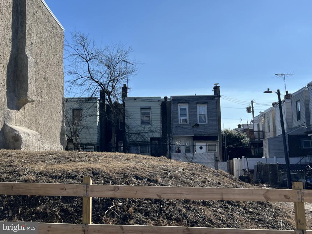 6310 Chester Avenue Philadelphia, PA 19142 - Photo 2 of 4 a view of a house with a snow in the yard