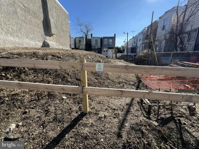 a view of a yard covered with snow