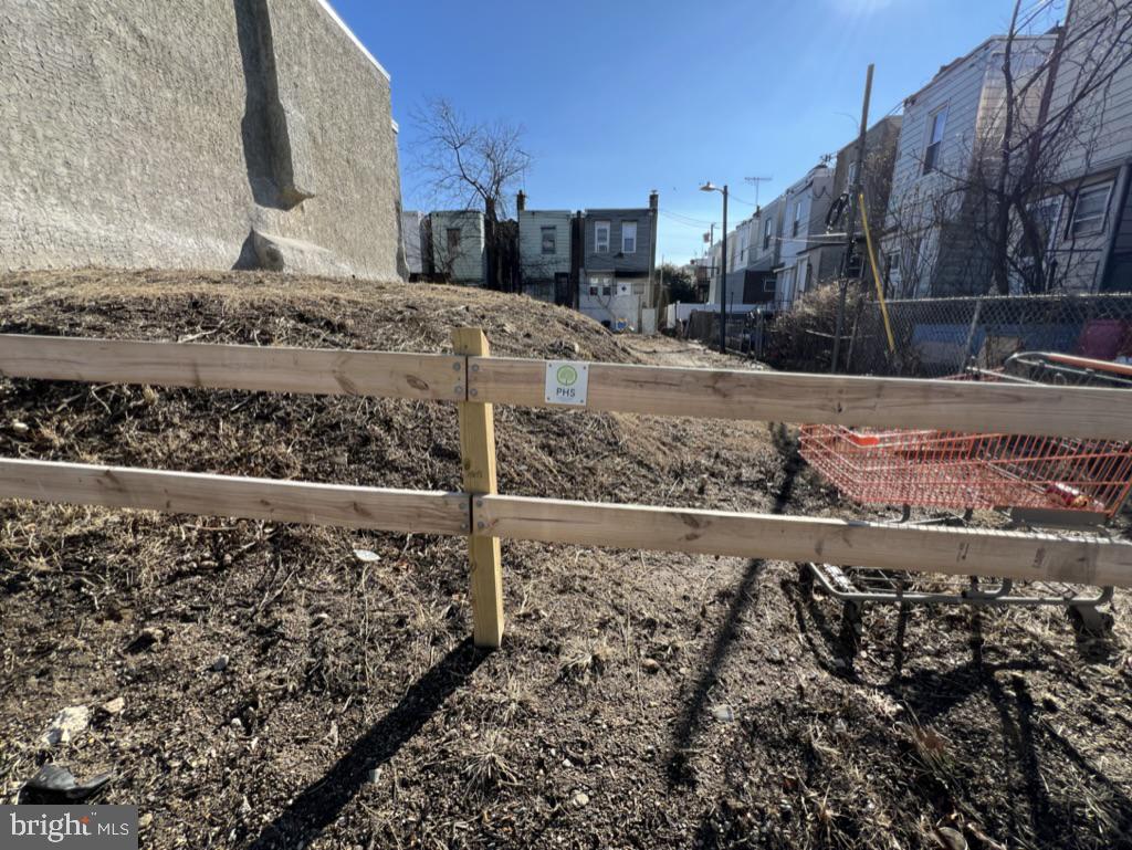 6310 Chester Avenue Philadelphia, PA 19142 - Photo 4 of 4 a view of a yard covered with snow
