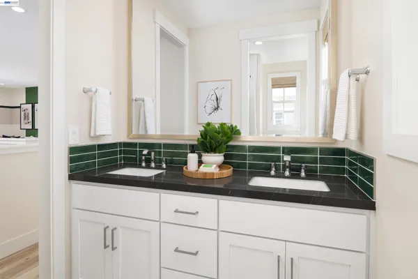 a bathroom with sink and mirror