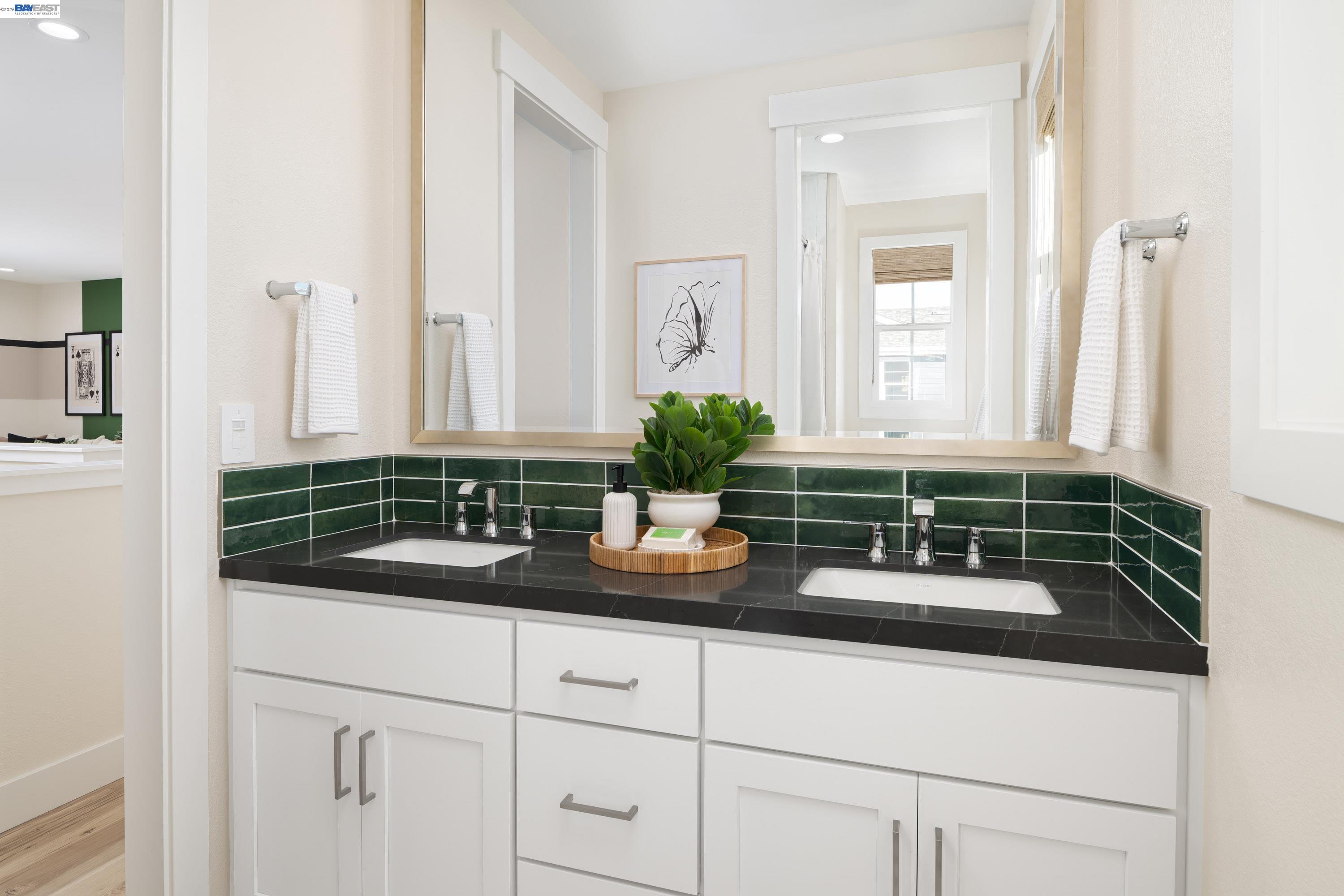 3868 Hereford Road Dublin, CA 94568 - Photo 15 of 22 a bathroom with sink and mirror