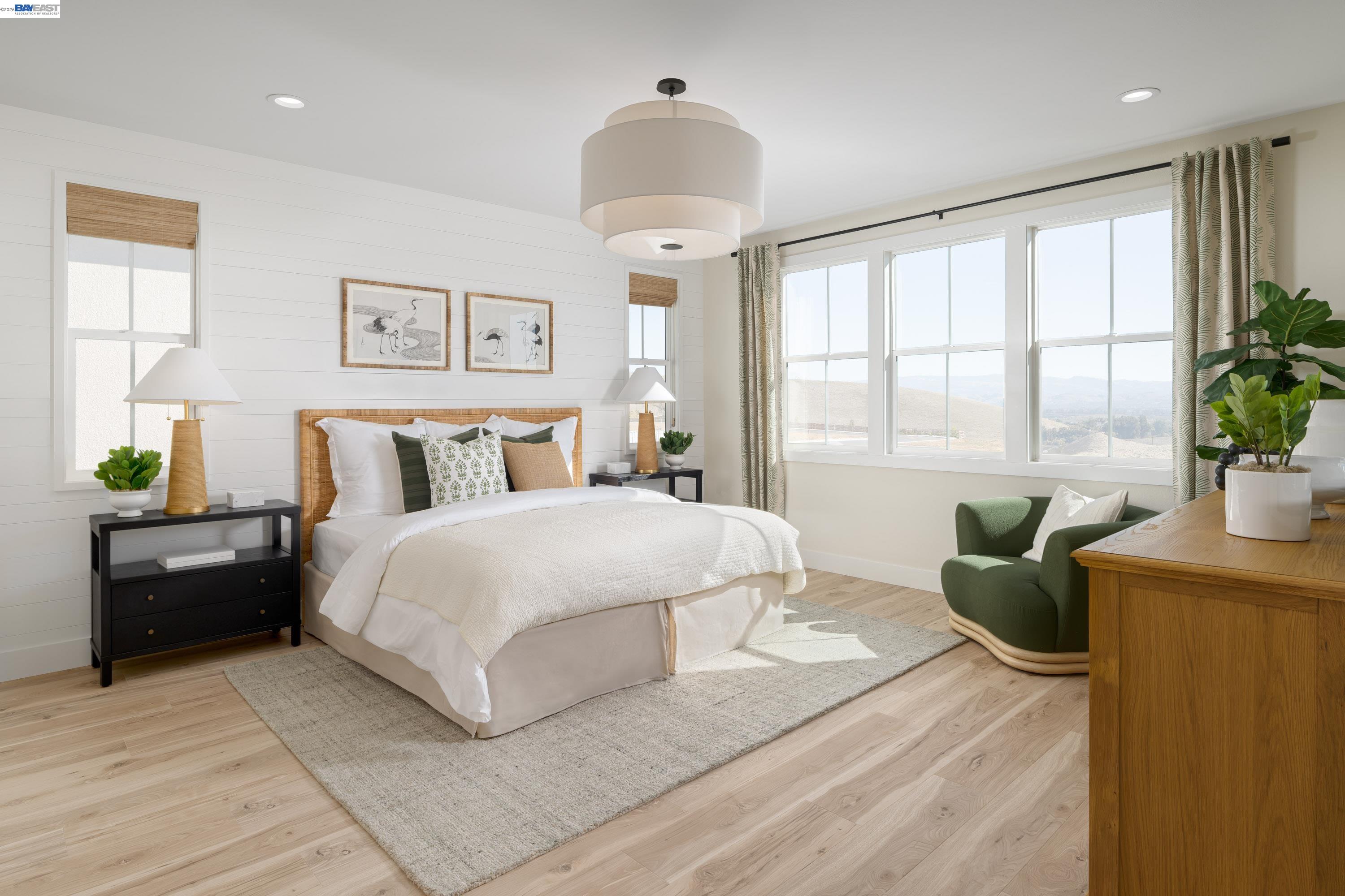 3868 Hereford Road Dublin, CA 94568 - Photo 10 of 22 a bedroom with a large bed and a couch