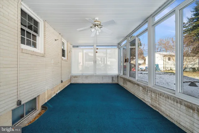 a view of an entryway with a chandelier