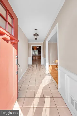 a view of an entryway and livingroom