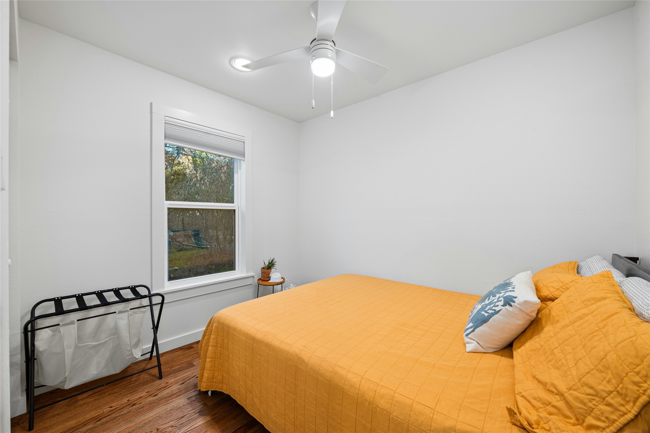 550 Cliffside Road Wimberley, TX 78676 - Photo 21 of 35 a bedroom with a bed and window