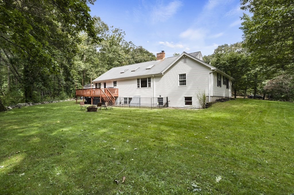 138 Lincoln Road Sutton, MA 01590 - Photo 15 of 35 a view of a house with a yard