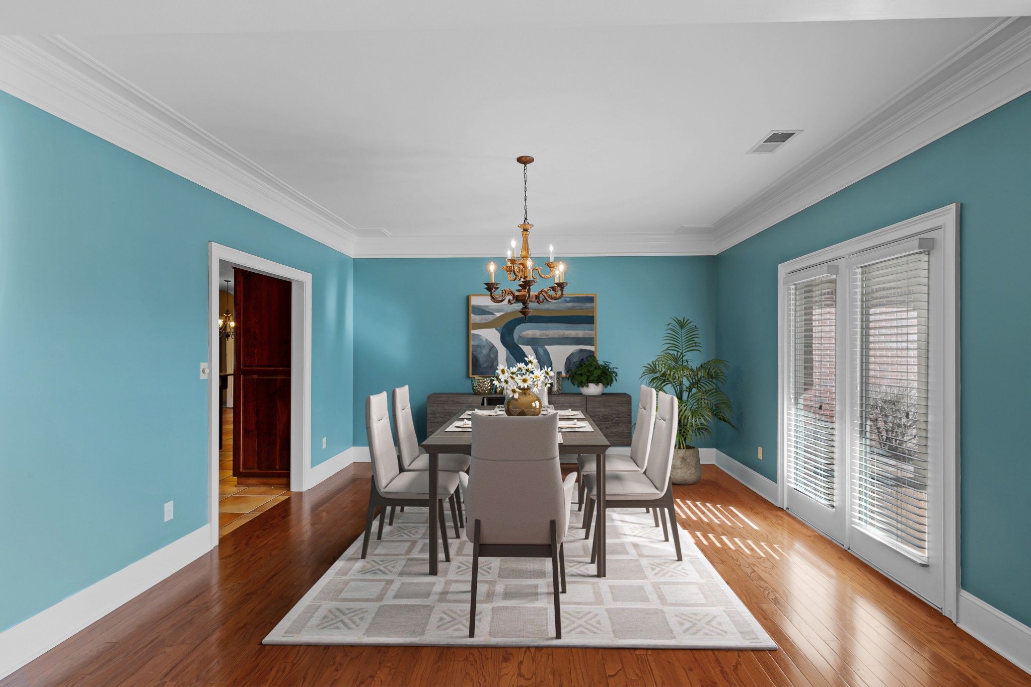 407 McLeary Road Jackson, TN 38305 - Photo 11 of 42 a dining room with furniture window and wooden floor