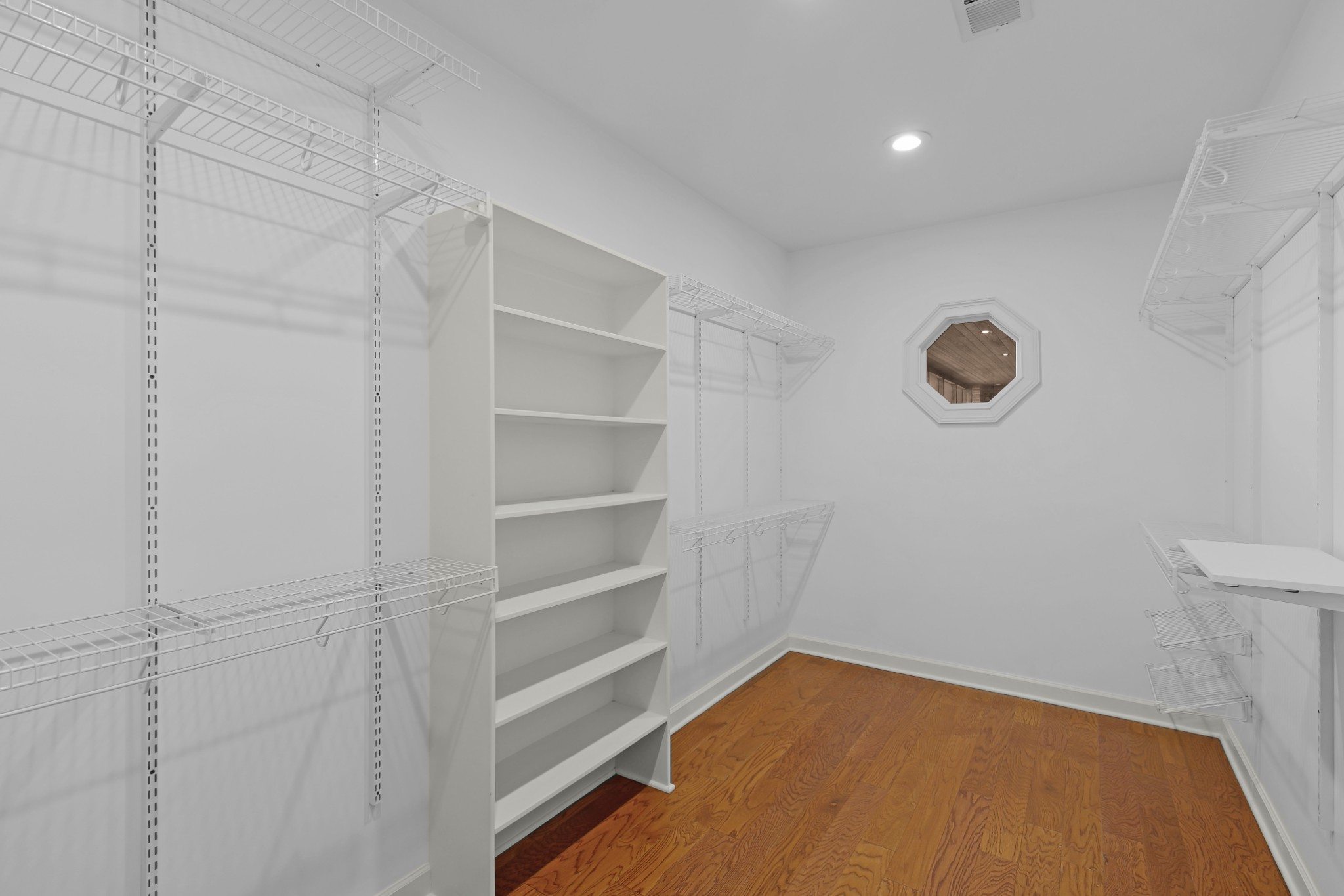 407 McLeary Road Jackson, TN 38305 - Photo 18 of 42 a view of a room with empty racks