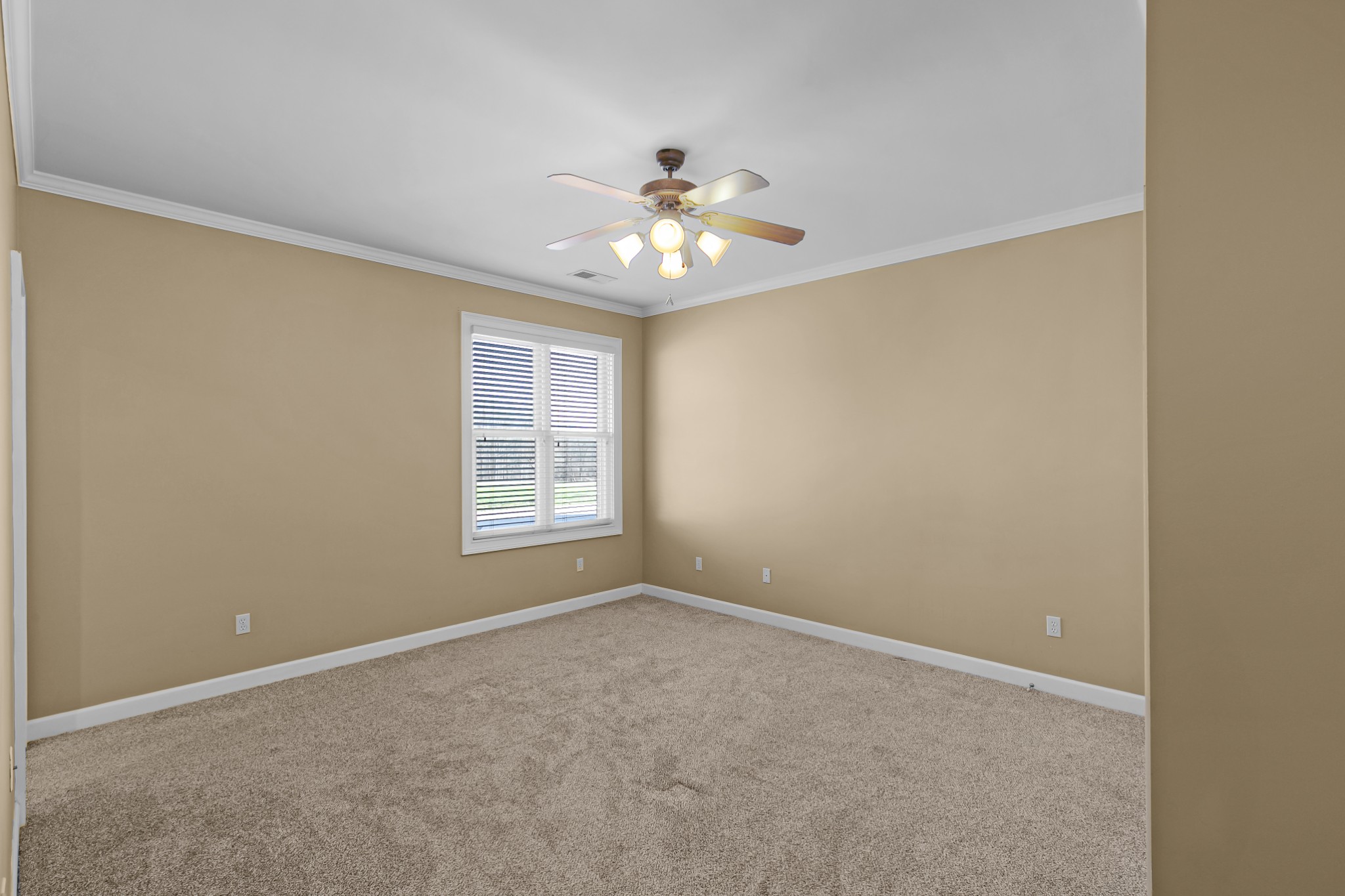 407 McLeary Road Jackson, TN 38305 - Photo 21 of 42 a view of an empty room with a window