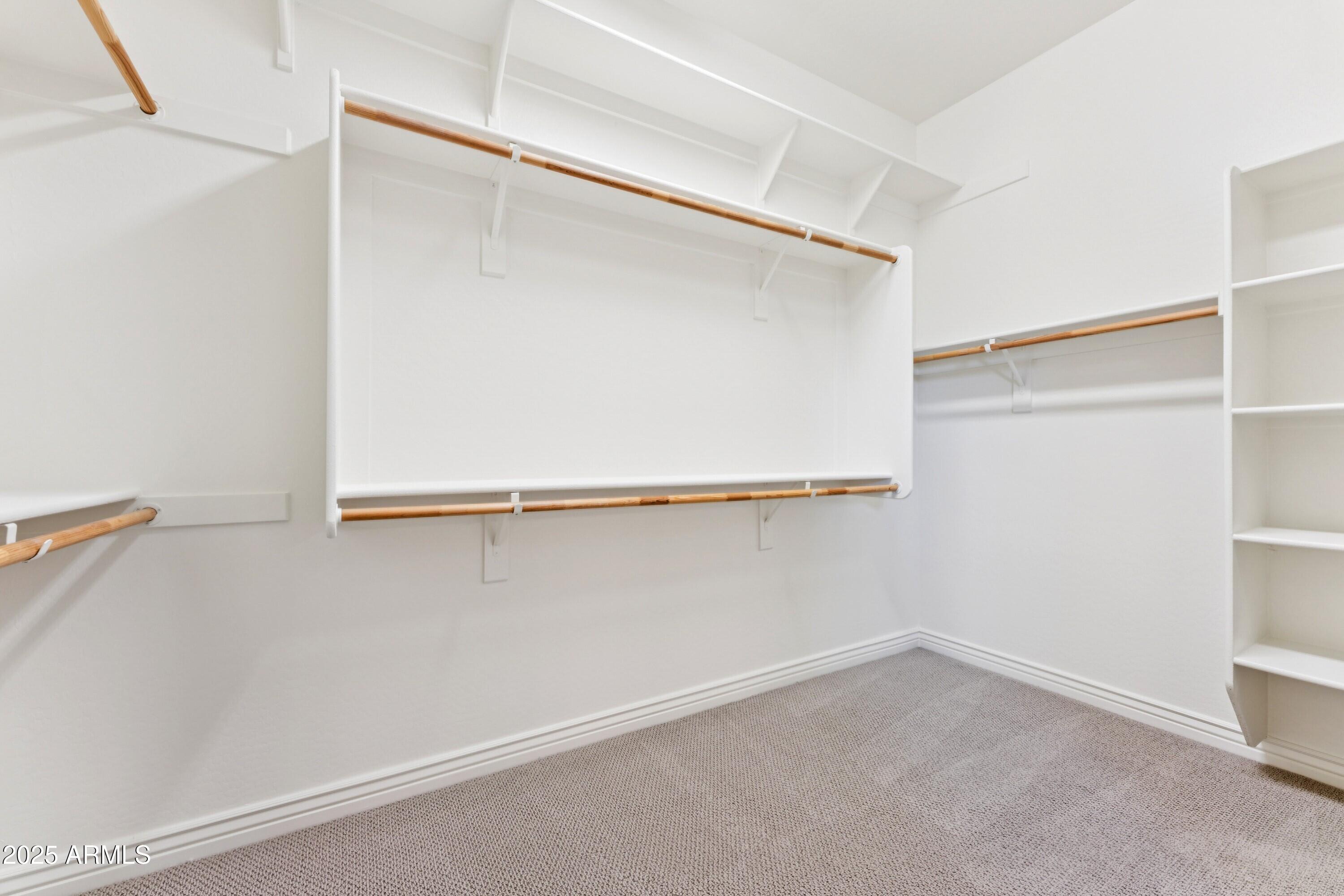 9916 West Redbird Road Peoria, AZ 85383 - Photo 23 of 96 a view of an empty walk in closet