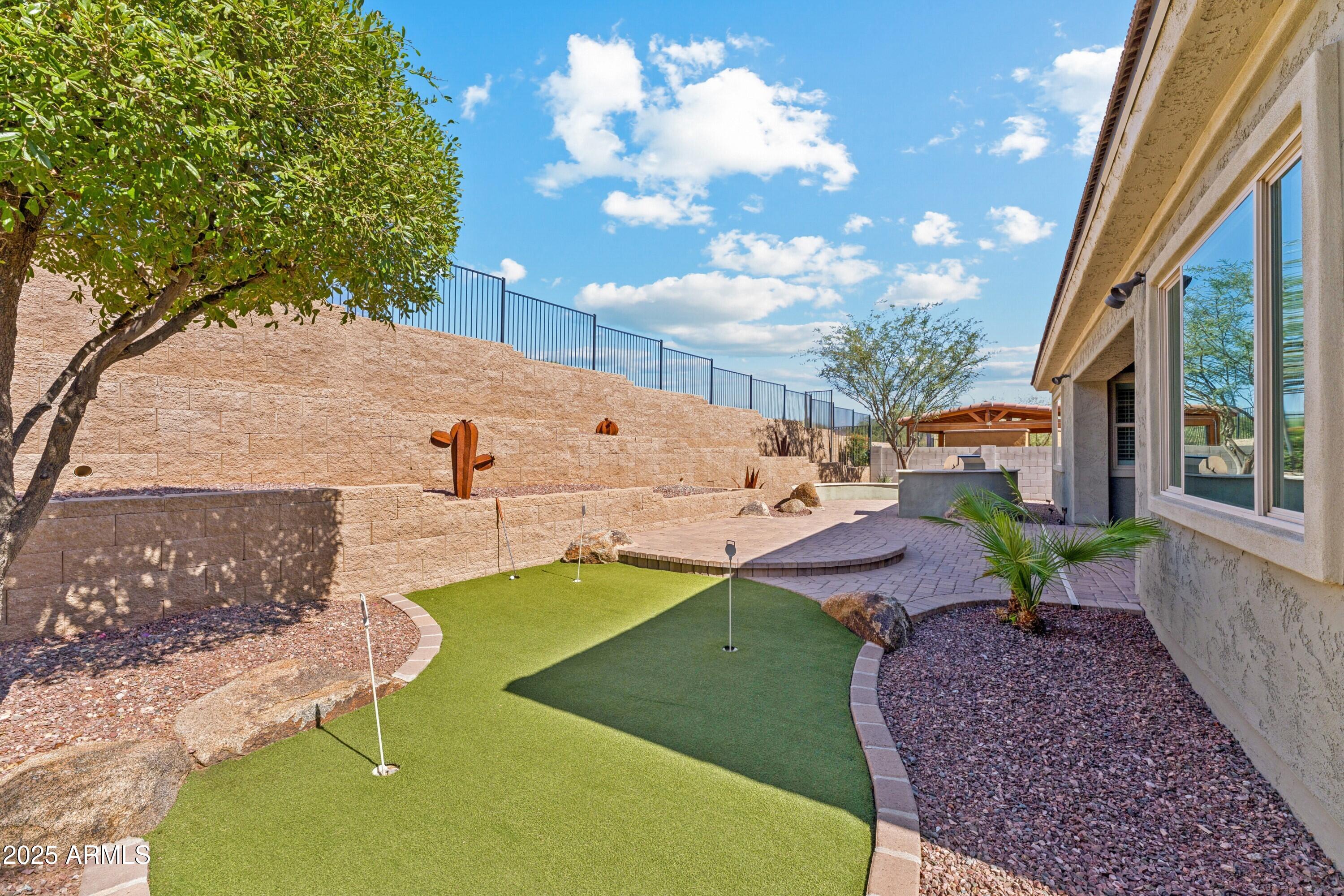 9916 West Redbird Road Peoria, AZ 85383 - Photo 38 of 96 Backyard Putting Green!