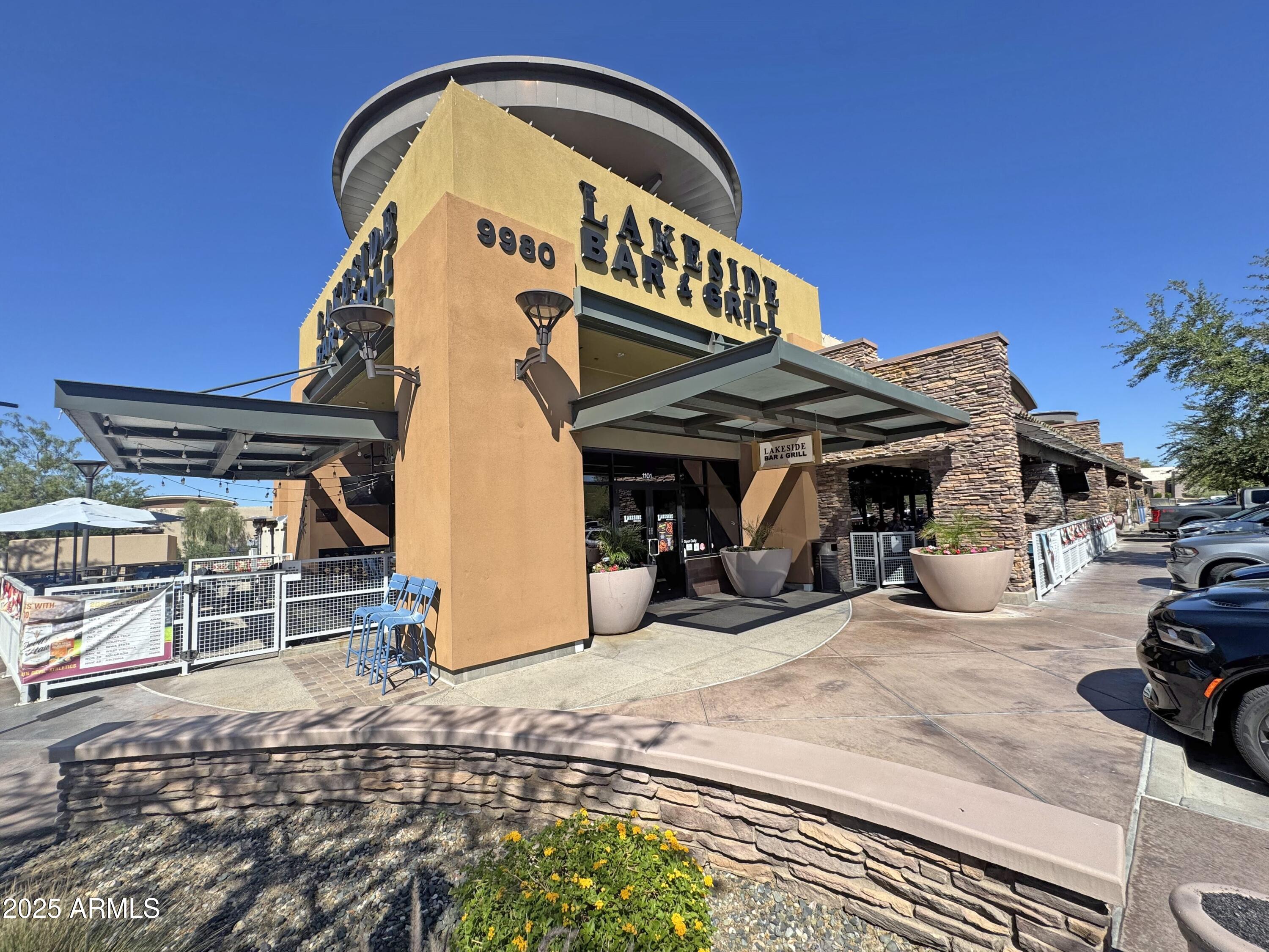 9916 West Redbird Road Peoria, AZ 85383 - Photo 87 of 96 a view of a house with a patio