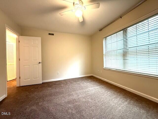 5800 Falls Of Neuse Road, Unit A Raleigh, NC 27609 - Photo 11 of 32 a view of an empty room with a window