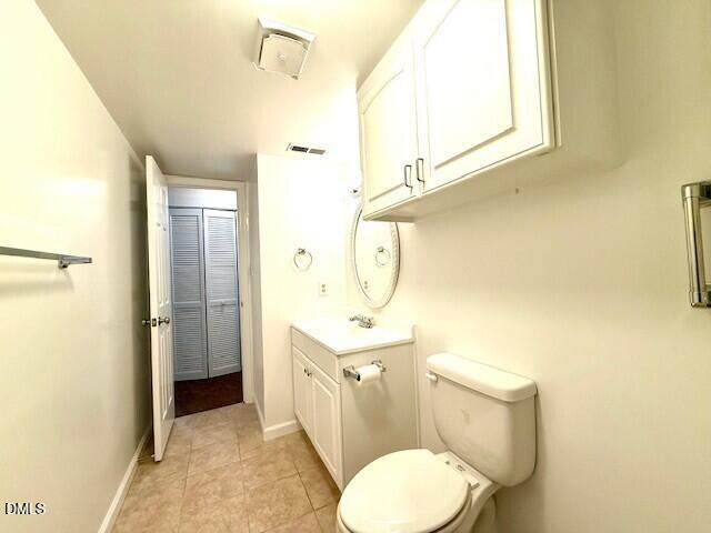 5800 Falls Of Neuse Road, Unit A Raleigh, NC 27609 - Photo 23 of 32 a bathroom with a sink toilet and shower