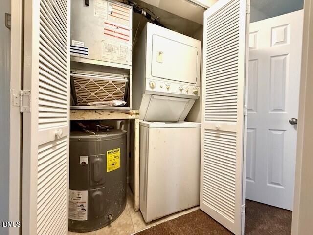 5800 Falls Of Neuse Road, Unit A Raleigh, NC 27609 - Photo 26 of 32 a utility room with washer and dryer