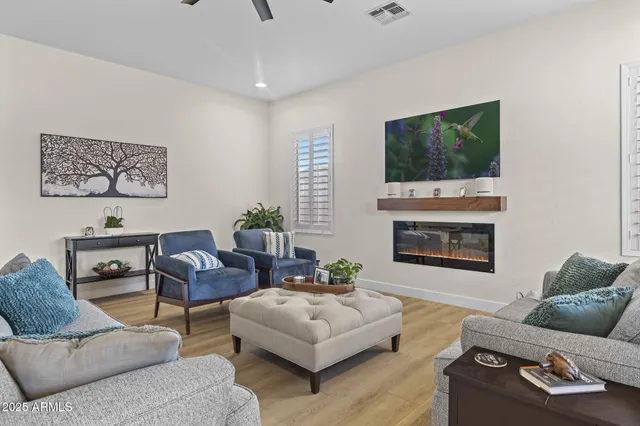 an outdoor space with patio lots of furniture and a lake view