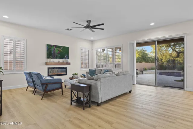 a bedroom with a bed and a chair