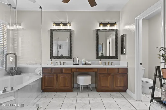 a view of a house with swimming pool and sitting area