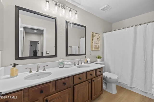 a view of a swimming pool with an outdoor seating