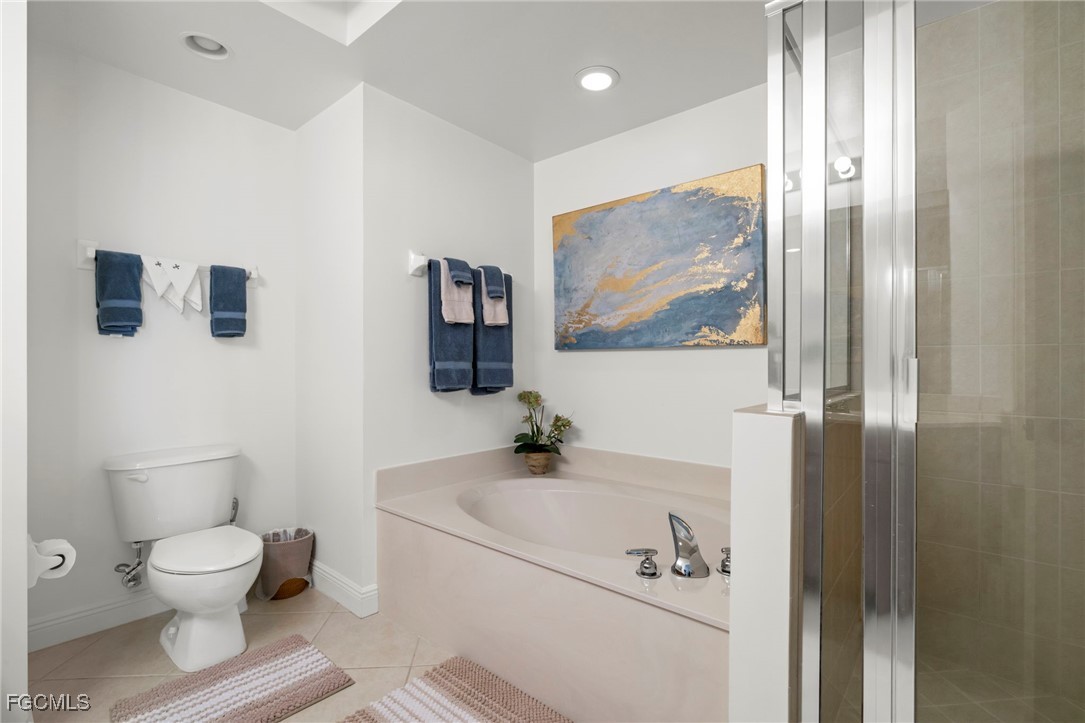 2745 First Street, Unit 2306 Fort Myers, FL 33916 - Photo 19 of 31 a bathroom with a sink and a mirror