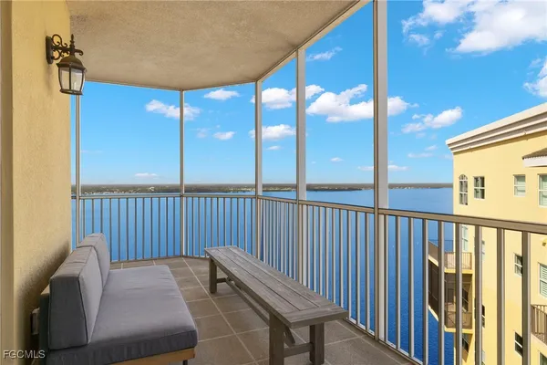 a view of balcony with furniture