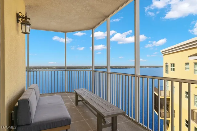 a view of balcony with furniture