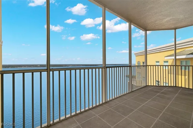 a view of a swimming pool with a lounge chairs